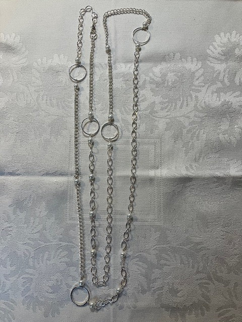 Silver chain, rings and pearls